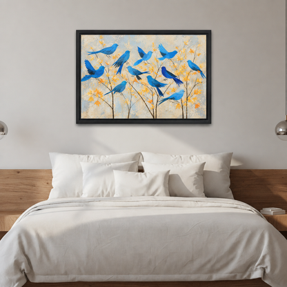 Framed modern blue birds autumn branches canvas wall art above a white bed with soft pillows