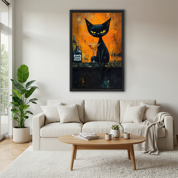 Framed moody black cat cocktail canvas wall art hanging above a warm-toned bedroom bed