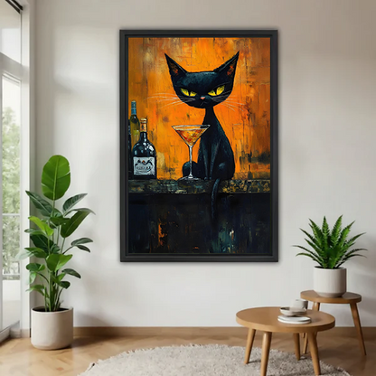 Framed moody black cat cocktail canvas wall art displayed beside green plants in a modern living room