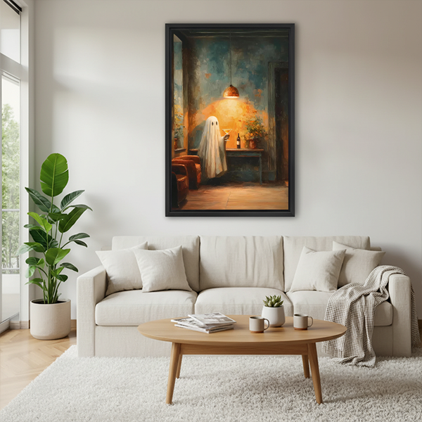 Woman holding framed moody ghost cocktail canvas wall art in a sunlit room