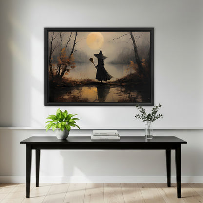 Vintage witch moon canvas wall art over a black entry table styled with a green plant