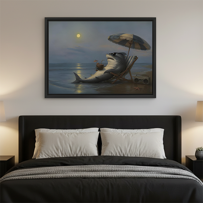 Woman holding black-framed moonlit beach shark canvas wall art showing a shark with a drink beneath a beach umbrella.