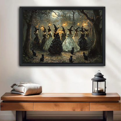 Moonlit forest witches canvas wall art without an outer frame above a wooden console beside a black lantern.