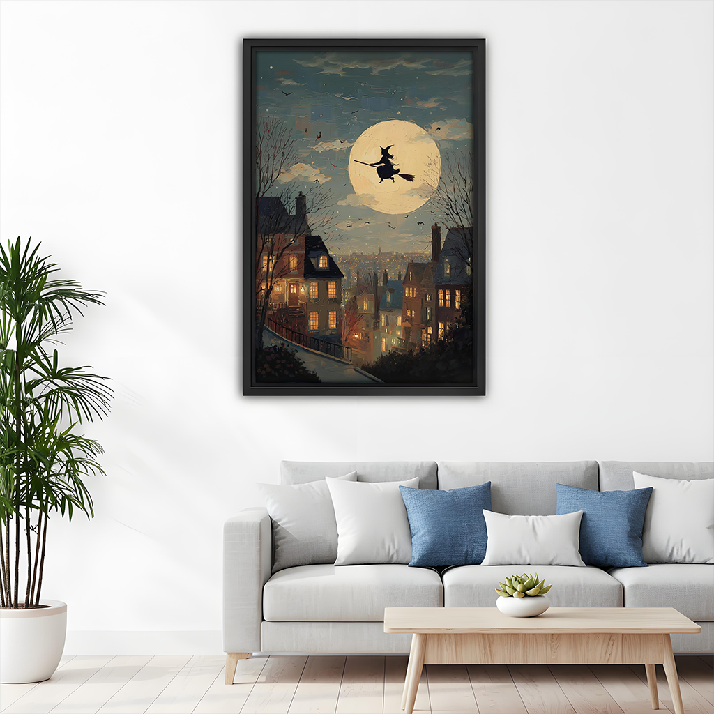 Gallery-wrap moonlit witch canvas wall art featuring a broomstick silhouette against a golden moon above a dining table.