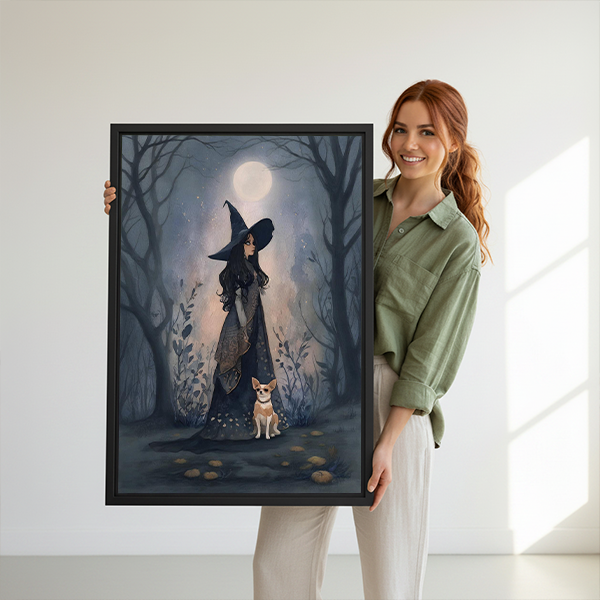 Moonlit witch in forest canvas wall art in a black frame above a cream sofa.