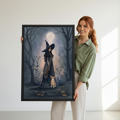 Moonlit witch in forest canvas wall art in a black frame above a cream sofa.