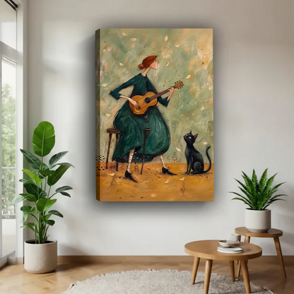 Framed musical woman and black cat canvas wall art with sage tones displayed between plants in a bright room.