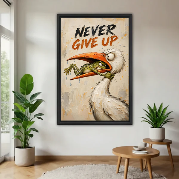 Black-framed Never Give Up canvas wall art with a frog and white bird beside a bed with rust bedding.
