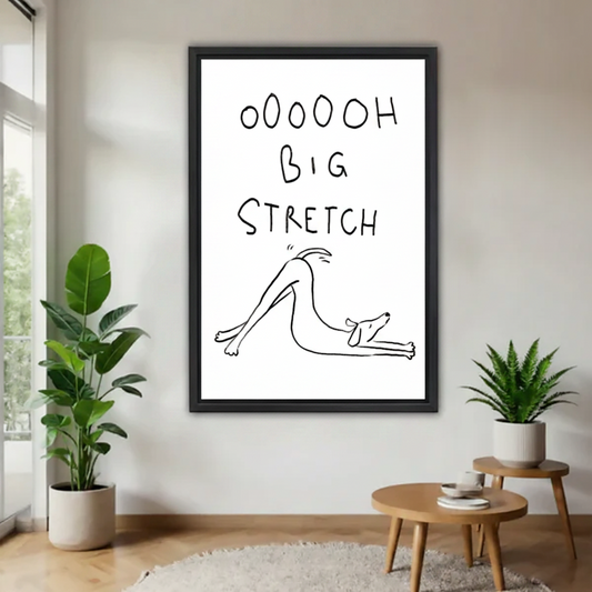 Black framed minimalist dog line art print reading OOOOOH BIG STRETCH, styled with indoor plants in a Scandinavian living room