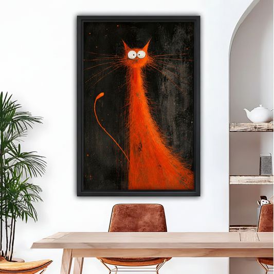 Black framed orange cat canvas wall art hanging above dining table in bright modern room