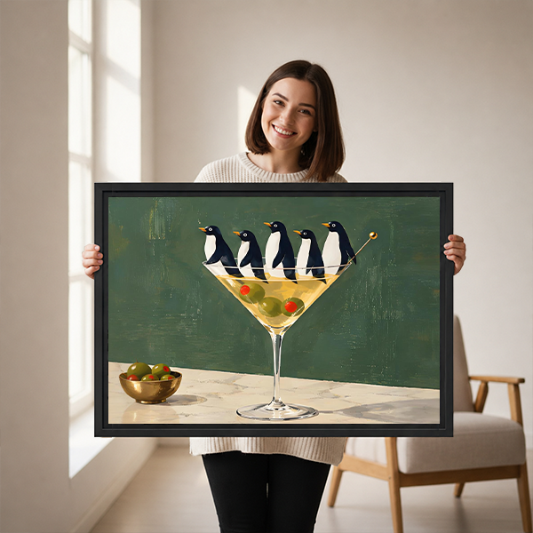 Penguin martini gallery-wrap canvas wall art displayed above a wooden console in a neutral interior.