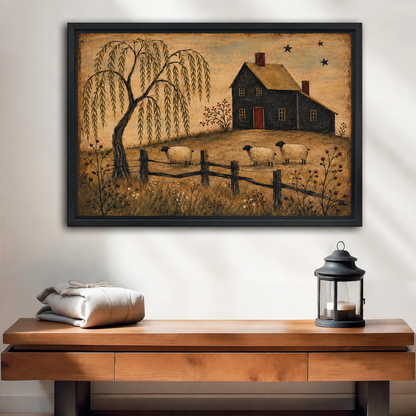 Black-framed primitive farmhouse canvas wall art above a wooden console with folded linens and a black lantern.