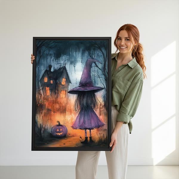 Black-framed purple witch canvas wall art with blue trees and orange mist displayed between green plants.