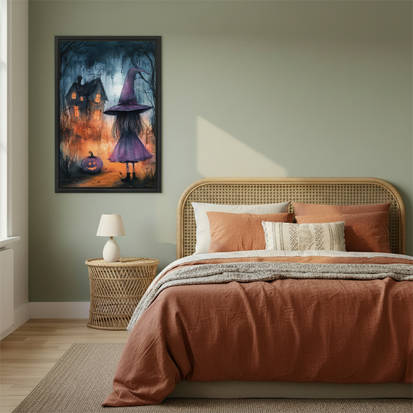 Woman holding black-framed purple witch canvas wall art featuring a glowing house and a jack-o’-lantern.