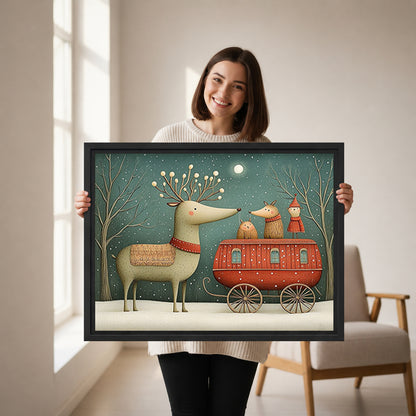 Woman holding framed reindeer caravan canvas wall art featuring a red wagon beneath a snowy teal sky