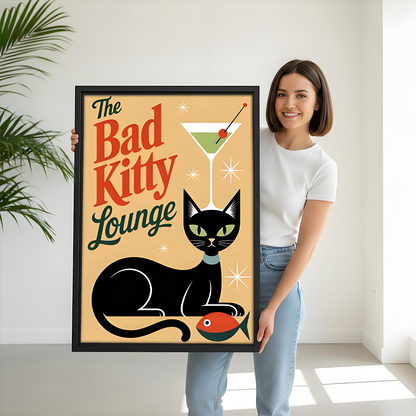 Woman holds framed retro black cat canvas wall art featuring Bad Kitty Lounge lettering and a martini.