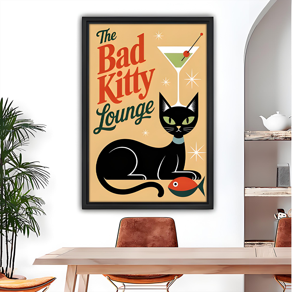 Framed retro black cat canvas wall art with Bad Kitty Lounge lettering hangs above a light sofa.