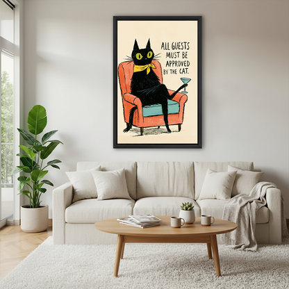 Framed retro black cat canvas wall art with a coral armchair beside a rattan bed and terracotta bedding.