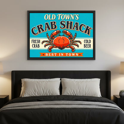 Vintage crab shack sign canvas wall art hanging above a dark upholstered bed with gray pillows