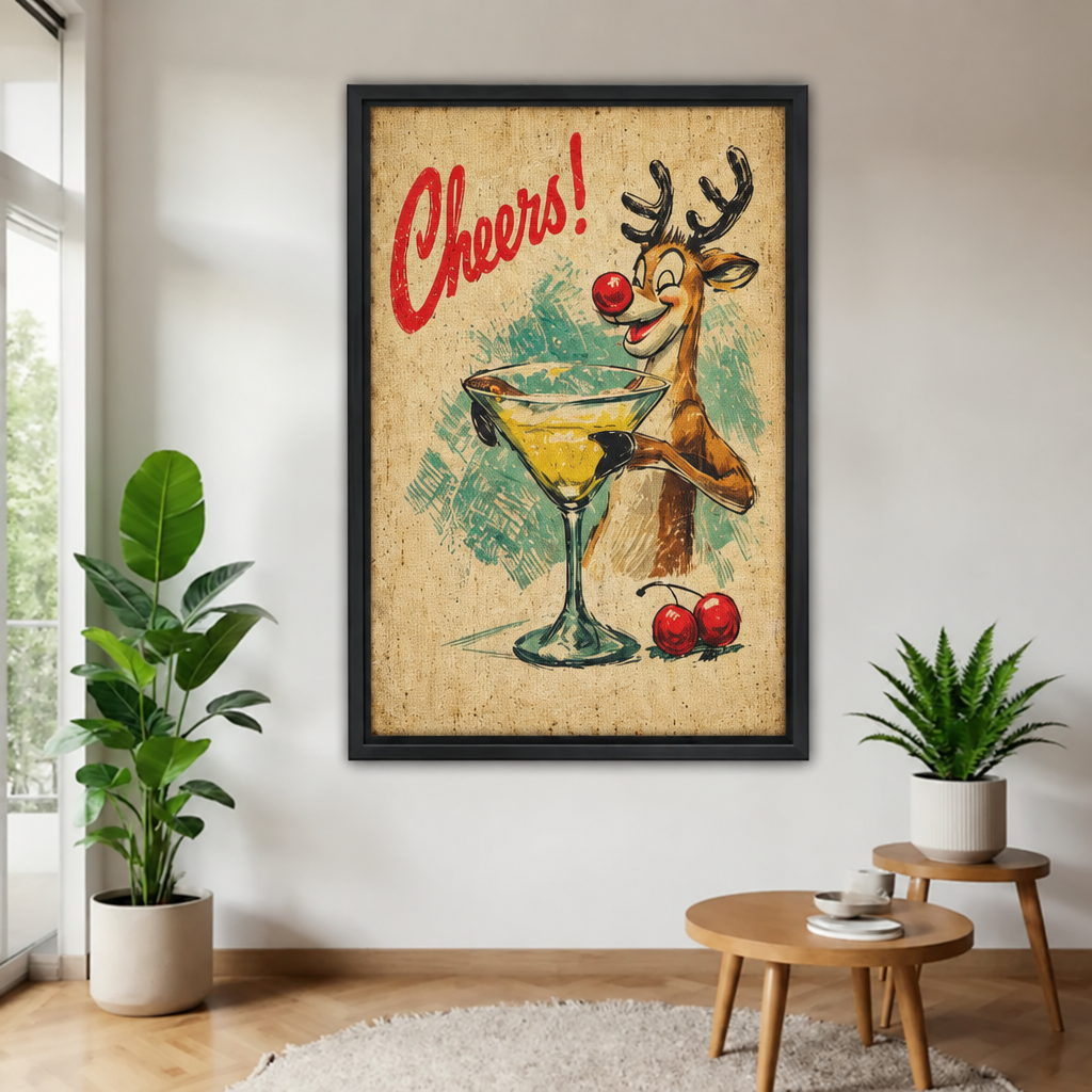 Black-framed retro reindeer cocktail wall art featuring a smiling reindeer and cherries, displayed near a bright window.