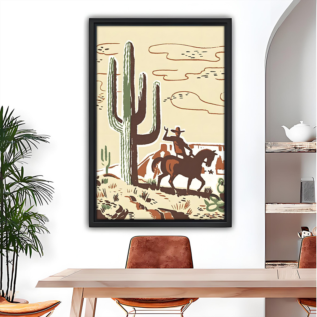 Retro western cowboy on horseback beside saguaro cactus framed canvas wall art above light wood dining table with leather chairs