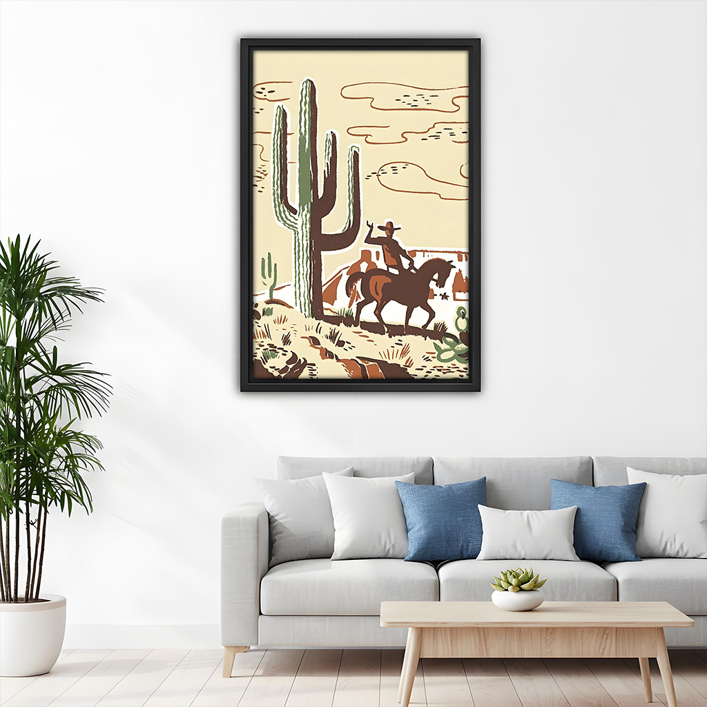 Retro western cowboy desert canvas wall art in black frame above gray sofa with blue accent pillows in minimalist living room
