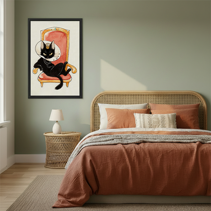 Woman holding black-framed royal black cat canvas wall art showing a crowned cat in a recovery cone on a throne.