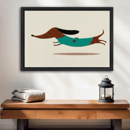 Minimalist running dachshund canvas wall art in teal vest, black frame displayed above a wooden console table with lantern