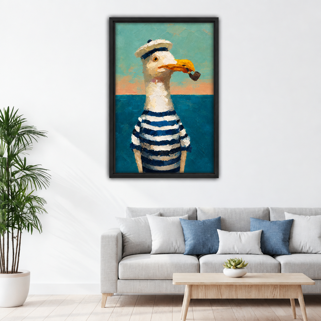 Framed painterly sailor seagull canvas wall art displayed above a grey sofa with blue pillows.