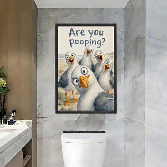 Framed seagull Are You Pooping canvas wall art in a marble bathroom