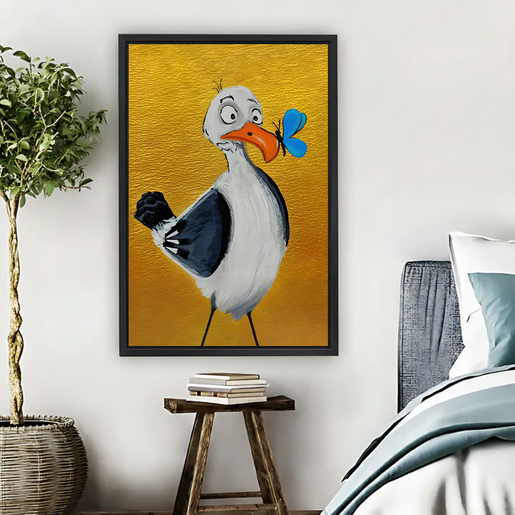 Woman holding black-framed seagull and butterfly canvas wall art featuring a cartoon bird against a golden yellow background.
