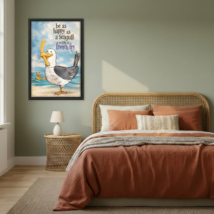  Seagull French fry wall art in a black frame beside a rattan bed with terracotta bedding.