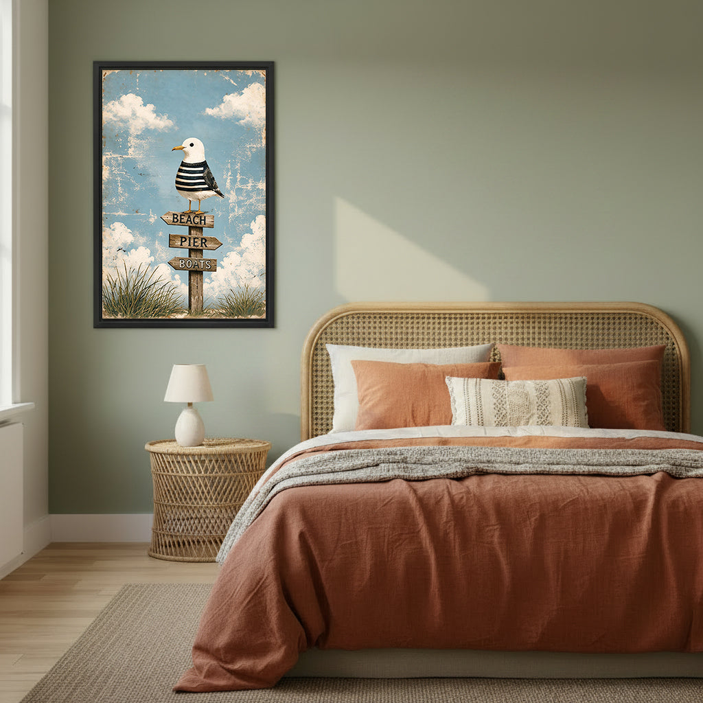 Framed coastal seagull signpost canvas wall art in a sage green bedroom