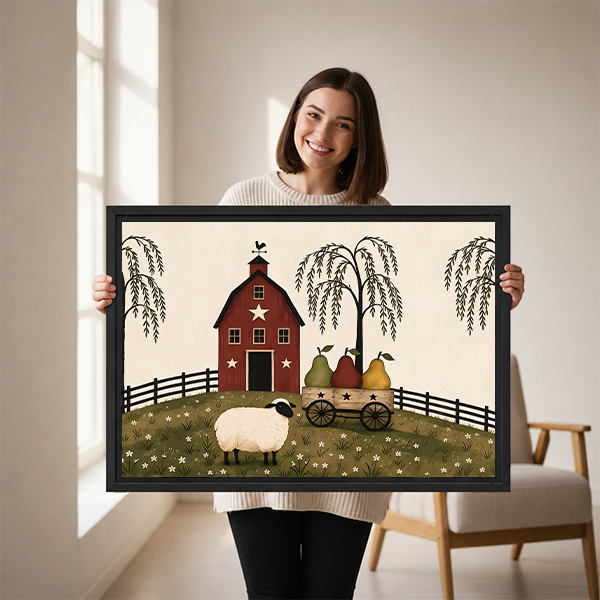 Black-framed sheep and red barn canvas wall art above a wooden console with folded blankets and a lantern.