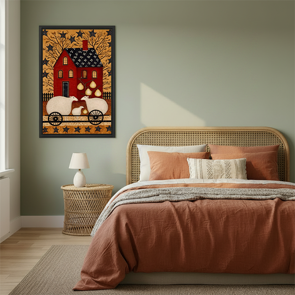 Primitive folk-art sheep and red farmhouse canvas wall art in a black frame above a cream sofa.