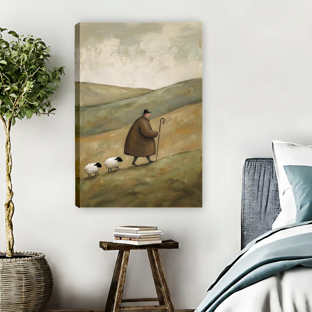 Woman seated on a sofa holding framed shepherd and sheep canvas wall art depicting two sheep crossing rolling hills.