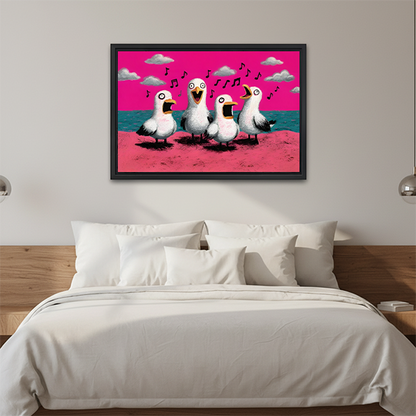 Black-framed singing seagulls canvas wall art with a bright pink sky displayed above a bed with white bedding.