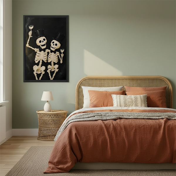 Woman holding gothic skeleton toast canvas wall art in a black frame, featuring top hats and stemmed glasses.