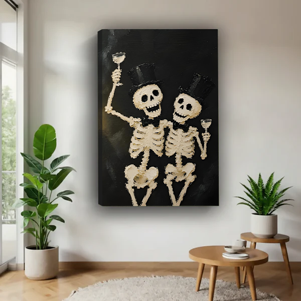 Gothic skeleton toast canvas wall art without an outer frame, displaying ivory skeletons and raised glasses between houseplants.