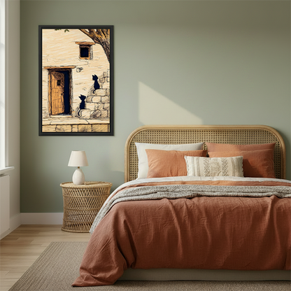 Sketch black cats stone cottage framed canvas art on sage green bedroom wall above rattan headboard with terracotta bedding