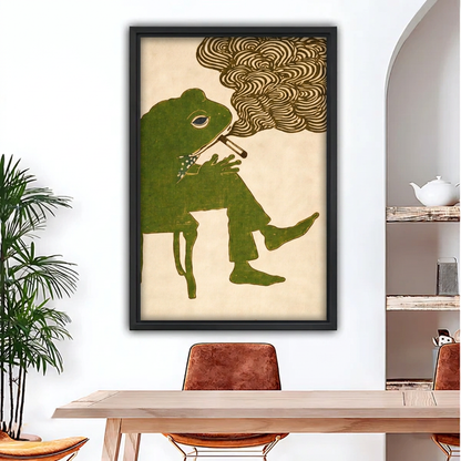 Black-framed smoking frog canvas wall art above a wooden dining table