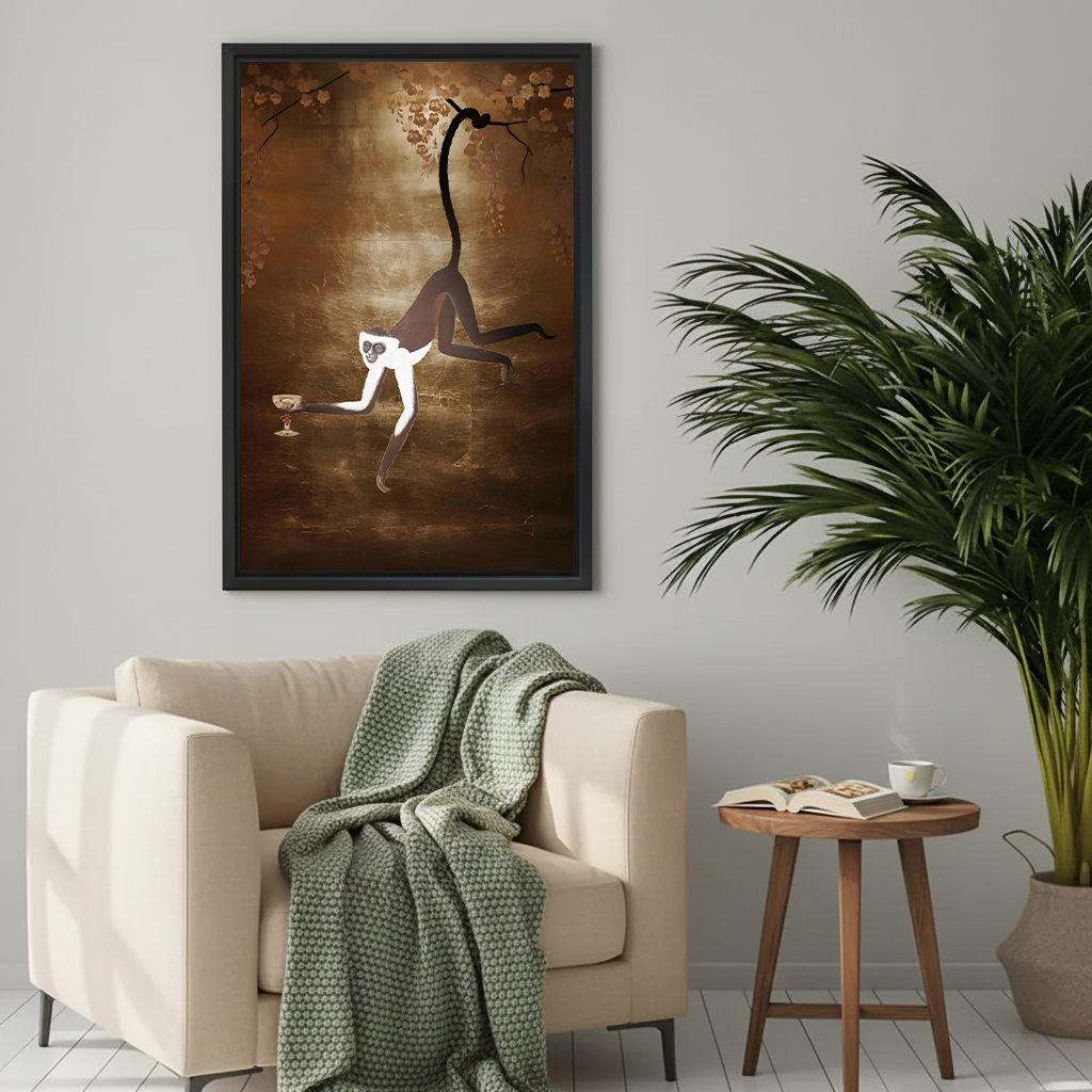 Framed spider monkey art print on a light grey wall above a cream armchair in a cosy living room