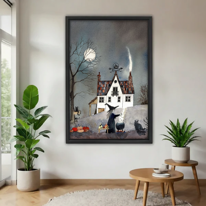 Spooky witch house canvas wall art displayed in a black frame against a bright accent wall.