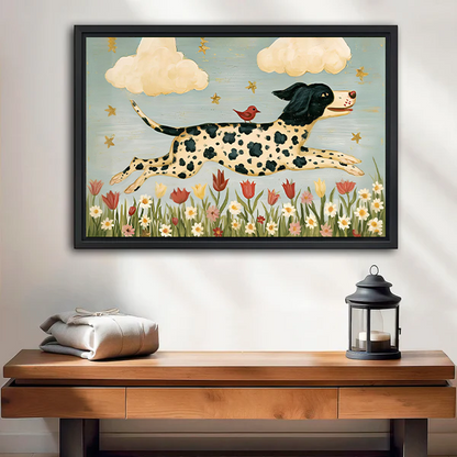 Black-framed spotted dog and bird canvas wall art with flowers and clouds displayed above a white bed.