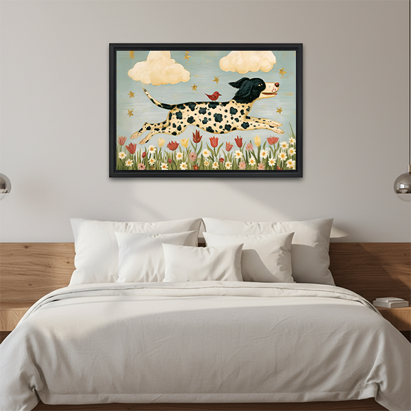 Woman holding framed spotted dog and bird canvas wall art with a blue-green sky and cheerful floral meadow.