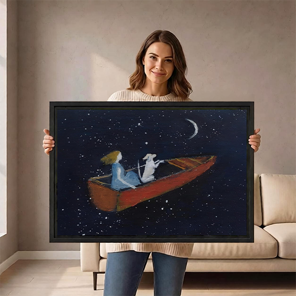 Woman holding a large framed starry night wall art print featuring a girl and white dog in a red boat, showing print scale and black frame