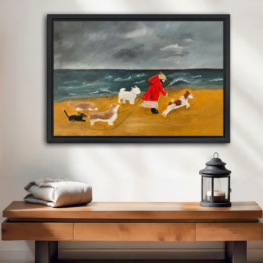Woman in red walking four dogs stormy beach framed canvas above wooden console table entryway