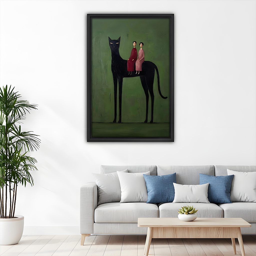 Framed surreal black cat folk wall art decorating a living room above a grey sofa