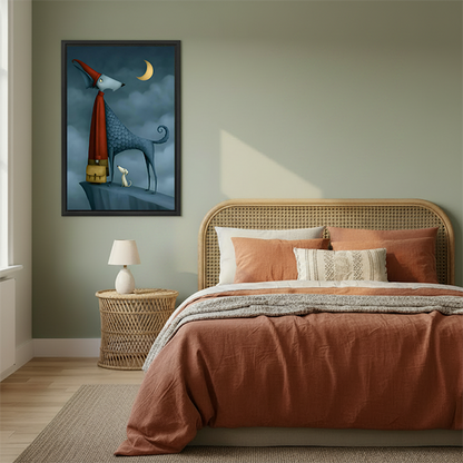 A woman holds framed whimsical blue dog moon artwork, showing the portrait canvas at human scale.