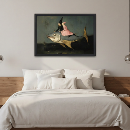 Black-framed surreal fish riders canvas wall art above a bed with white bedding and a wooden headboard.